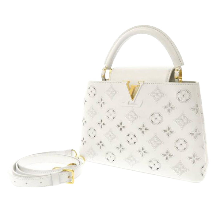 Louis Vuitton Capucines BB in White Cutout Lace Emboidered Leather – Vault  55