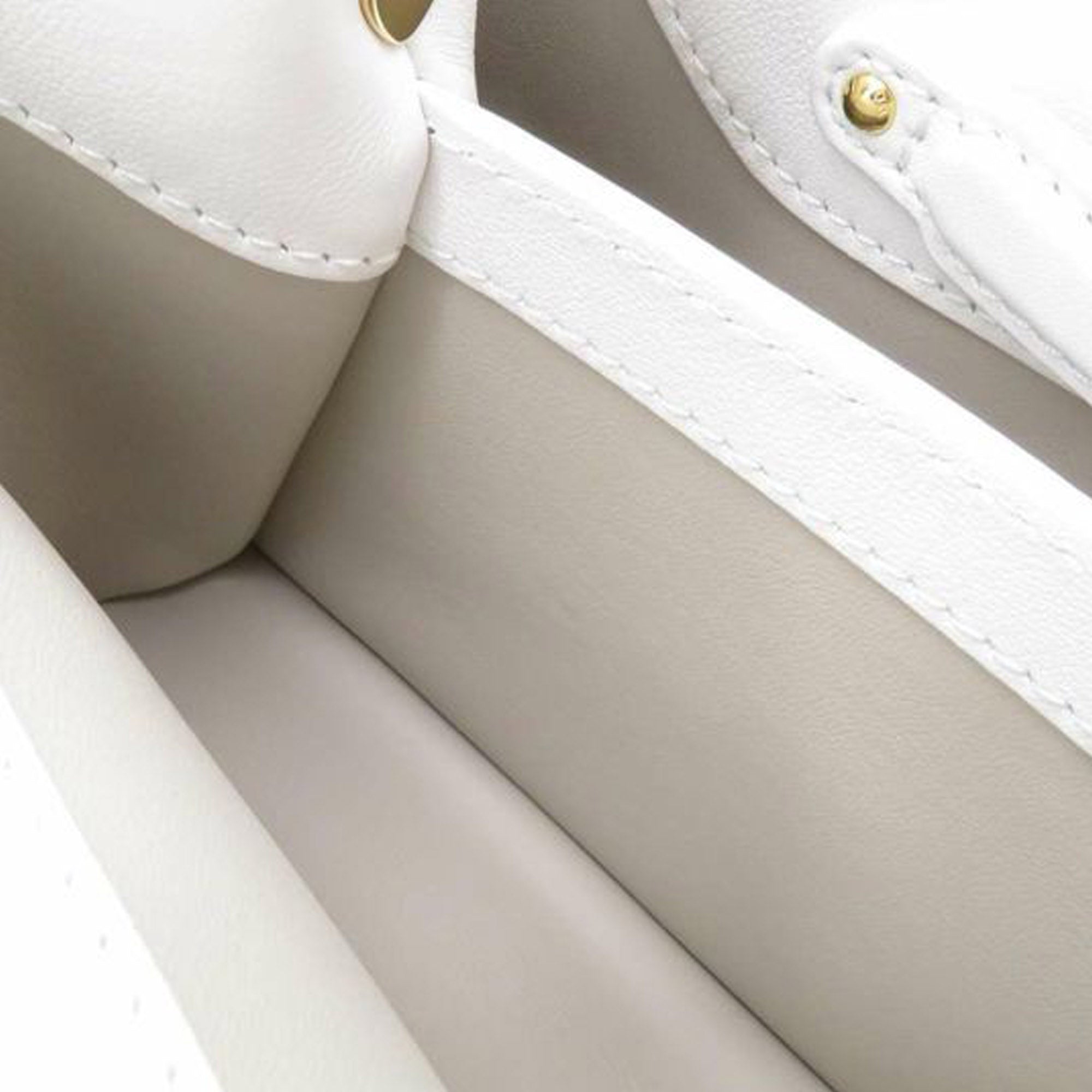 Sold at Auction: Louis Vuitton, Louis Vuitton Capucines Bag Monogram Cutout  Broderie Leather BB White